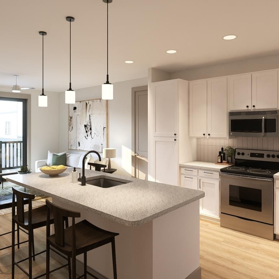 a kitchen with white cabinets